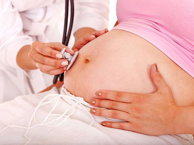 Причины боли в боках при беременности